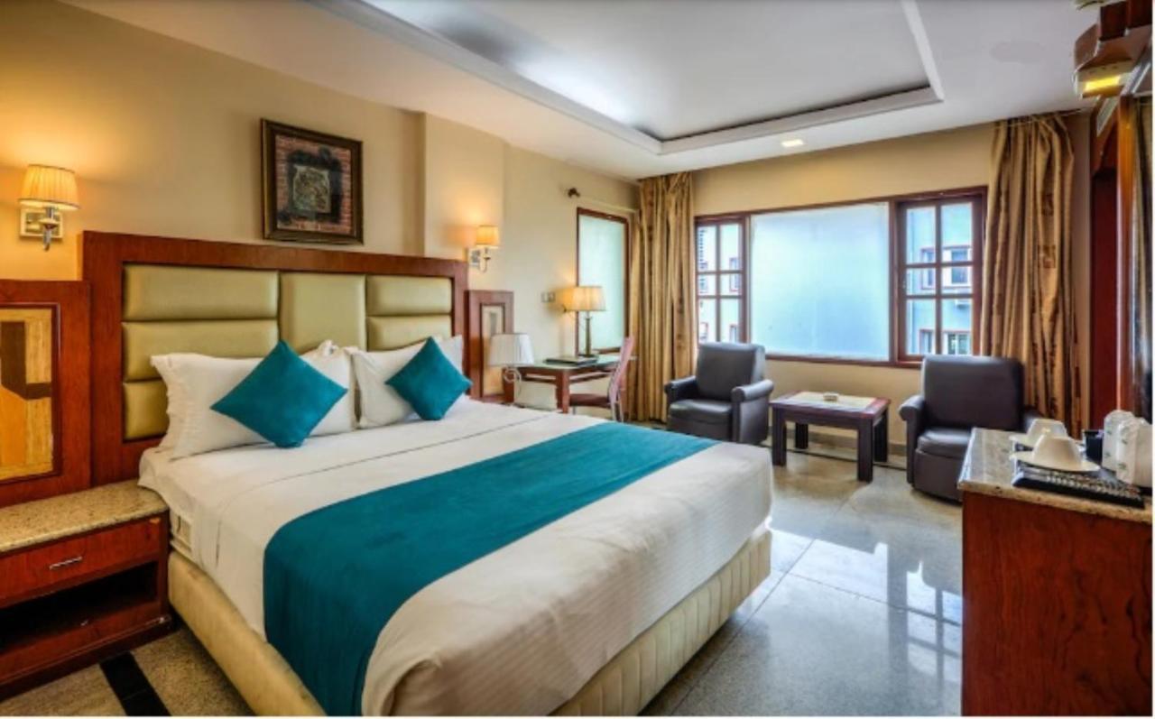 Golden Metro Hotel Bangalore Esterno foto