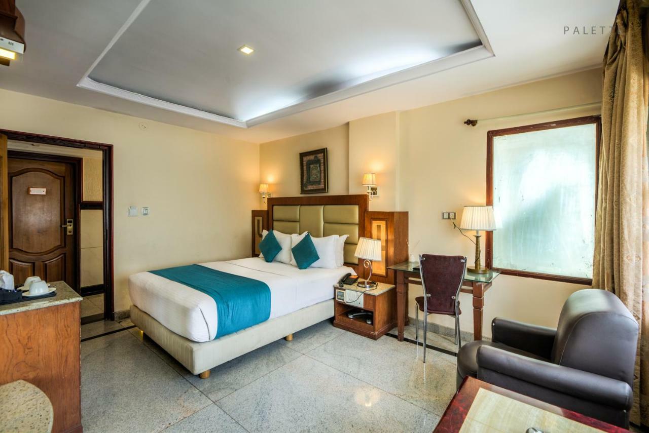 Golden Metro Hotel Bangalore Esterno foto
