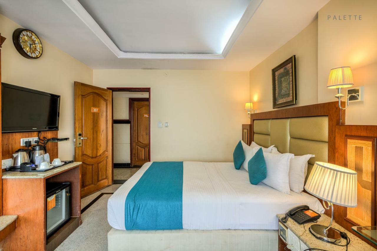 Golden Metro Hotel Bangalore Esterno foto